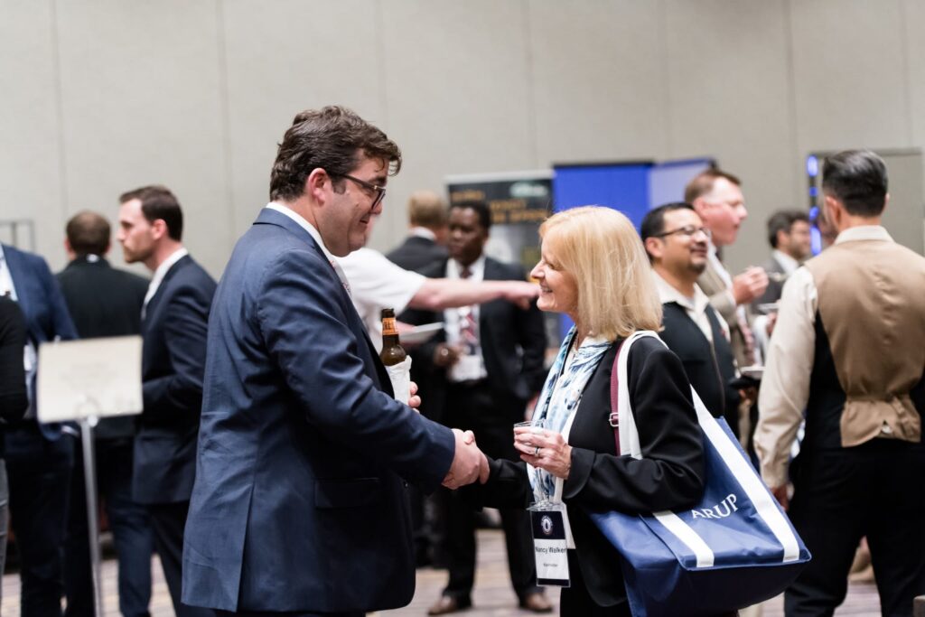 man and woman shaking hands